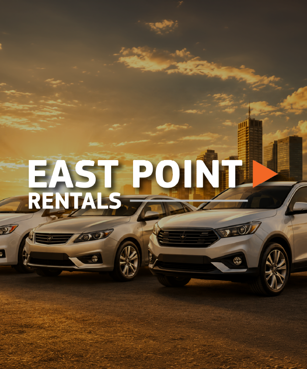 Sunset scene with a row of rental cars and the East Point Rentals logo overlaid on the image.