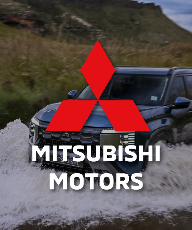 SUV driving through water splash with Mitsubishi Motors logo overlay in the foreground